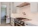 Modern kitchen features stainless appliances, granite countertops, and ample cabinet storage at 3145 E Boot Track Trl, Gilbert, AZ 85296