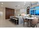 Bright kitchen with large island, modern cabinets and separate breakfast nook at 3145 E Boot Track Trl, Gilbert, AZ 85296