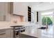 Bright kitchen features stainless appliances, granite countertops, and ample cabinet and counter space at 3145 E Boot Track Trl, Gilbert, AZ 85296
