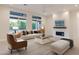 Bright living room with modern decor, stylish furniture, and an open floor plan at 3145 E Boot Track Trl, Gilbert, AZ 85296