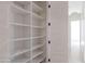 Well-organized pantry with adjustable shelving for ample storage, providing functionality and convenience at 3145 E Boot Track Trl, Gilbert, AZ 85296