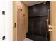 Modern tiled shower with black accent tiles, shower bench, and dual shower heads at 3145 E Boot Track Trl, Gilbert, AZ 85296