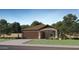 Charming one-story home with a well-maintained lawn, a 2-car garage, and desert landscaping in the front at 32243 N Garnet Way, San Tan Valley, AZ 85143