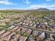 High aerial view of the neighborhood, featuring well-maintained homes and desert landscape at 3394 E Tiffany Ct, Gilbert, AZ 85298