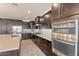 Modern kitchen with a spacious island, stainless steel appliances, and ample storage at 3394 E Tiffany Ct, Gilbert, AZ 85298