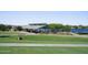 Picturesque park featuring a covered picnic area and lake access, perfect for outdoor gatherings and relaxation at 3394 E Tiffany Ct, Gilbert, AZ 85298