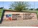 Gilbert Regional Park sign listing amenities like the amphitheater and sports courts at 3394 E Tiffany Ct, Gilbert, AZ 85298