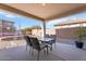 Covered patio area with outdoor furniture, perfect for entertaining or relaxing outdoors at 3394 E Tiffany Ct, Gilbert, AZ 85298