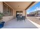 View of the backyard patio with ample space and outdoor seating, ideal for outdoor activities at 3394 E Tiffany Ct, Gilbert, AZ 85298