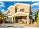 Spacious backyard featuring a covered patio, desert landscaping with beautiful palm trees at 3634 S Danielson Way, Chandler, AZ 85286