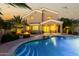 Stunning backyard with a refreshing pool, covered patio, and cozy fire pit area at 3634 S Danielson Way, Chandler, AZ 85286