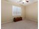 Bedroom featuring neutral carpet, shuttered windows and a ceiling fan at 3634 S Danielson Way, Chandler, AZ 85286