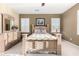 Elegant bedroom with neutral decor, shuttered windows, and plush carpet, creating a serene and inviting atmosphere at 3634 S Danielson Way, Chandler, AZ 85286