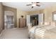 Spacious main bedroom with neutral tones, leading to an en-suite bathroom and upper level, offering comfort and convenience at 3634 S Danielson Way, Chandler, AZ 85286