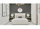Comfortable bedroom featuring a stylish bed, soft lighting, and coordinated decor at 3738 E Gold Mountain Ave, San Tan Valley, AZ 85143