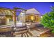 Backyard featuring a covered outdoor kitchen and paver patio at 3753 E Ellis St, Mesa, AZ 85205