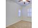 Cozy bedroom with neutral walls, carpet floors, ceiling fan and shutters at 3753 E Ellis St, Mesa, AZ 85205