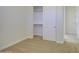 Bedroom with carpet floors and a walk-in closet; perfect for storage at 3753 E Ellis St, Mesa, AZ 85205