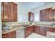 Beautiful kitchen with stainless steel appliances, granite countertops, and custom cabinetry at 3753 E Ellis St, Mesa, AZ 85205
