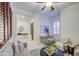 Cozy living room with neutral tones, shuttered windows, and comfortable seating arrangement at 3753 E Ellis St, Mesa, AZ 85205