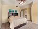Spacious main bedroom with custom headboard, carpeted floors, and walk-in closet at 3971 E Heather Ct, Gilbert, AZ 85234