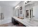 Clean bathroom features double sinks and a tub with updated fixtures at 4019 W Charlotte Dr, Glendale, AZ 85310