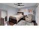 Cozy bedroom with wood floors, a plush rug, and neutral decor at 4019 W Charlotte Dr, Glendale, AZ 85310
