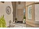 Charming front entrance featuring a decorative security door, stucco walls, and decorative features at 4019 W Charlotte Dr, Glendale, AZ 85310