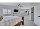 Bright main bedroom boasts plantation shutters and updated fixtures at 4019 W Charlotte Dr, Glendale, AZ 85310