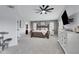 Spacious main bedroom with large bed and updated fixtures at 4019 W Charlotte Dr, Glendale, AZ 85310