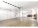 Spacious garage with epoxy floors, ample storage cabinets, and lots of workspace at 4310 E Sacaton St, Phoenix, AZ 85044