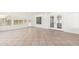 Bright sun room with tile flooring offers access to the backyard at 4310 E Sacaton St, Phoenix, AZ 85044