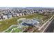 Aerial view of a neighborhood park featuring a skate park, playground, and green space at 4512 S Ferric Ave, Mesa, AZ 85212