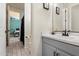 Hall bathroom with a single vanity and tile flooring at 4512 S Ferric Ave, Mesa, AZ 85212
