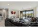 Comfortable living room with access to the backyard and view of the pool at 4512 S Ferric Ave, Mesa, AZ 85212