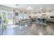 Dining area flows into the kitchen and features a sliding glass door to backyard at 45543 W Guilder Ave, Maricopa, AZ 85139
