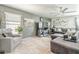 Inviting living room with modern decor, plush seating, and decorative wall art at 45543 W Guilder Ave, Maricopa, AZ 85139