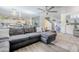 Bright open-concept living space with seamless flow to the kitchen and staircase at 45543 W Guilder Ave, Maricopa, AZ 85139
