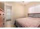 Bedroom offers a bright interior with a large window, ceiling fan and access to the patio at 4615 S Primrose Dr, Gold Canyon, AZ 85118