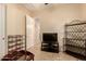 Bonus room with tiled floors, ceiling fan, and furnishings at 4615 S Primrose Dr, Gold Canyon, AZ 85118
