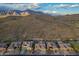 Beautiful aerial view of homes in a community with desert mountain backdrop at 4615 S Primrose Dr, Gold Canyon, AZ 85118