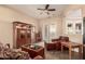Comfortable living room with wooden furnishings, tile flooring, and open layout at 4615 S Primrose Dr, Gold Canyon, AZ 85118