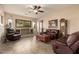 Living room showcasing tile floors, recessed lighting, and an entertainment center at 4615 S Primrose Dr, Gold Canyon, AZ 85118