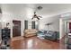 Inviting living room featuring hardwood floors, neutral paint, and abundant natural light at 5137 N 20Th Ave, Phoenix, AZ 85015