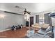 Inviting living room featuring hardwood floors, neutral paint, and abundant natural light at 5137 N 20Th Ave, Phoenix, AZ 85015