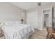 Bright bedroom with hardwood floors and sliding closet doors at 5653 E Sayan St, Mesa, AZ 85215