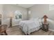 Bright bedroom with hardwood floors, and unique window features at 5653 E Sayan St, Mesa, AZ 85215