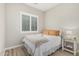Bright bedroom with hardwood floors and shuttered window features at 5653 E Sayan St, Mesa, AZ 85215