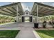 Expansive outdoor area with covered pavilion, lush landscaping, and ample space for entertainment and relaxation at 5653 E Sayan St, Mesa, AZ 85215