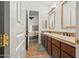 Bright bathroom featuring double sinks, and access to the main bedroom at 5690 E Canyon Creek Cir, Carefree, AZ 85377